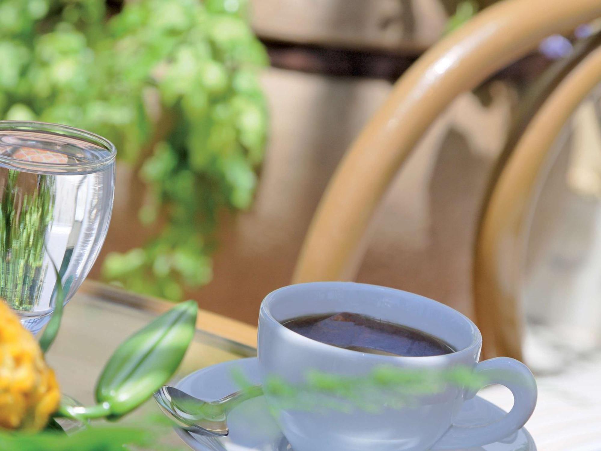 Moevenpick Hotel Cairo - Media City Giza Exterior foto A cup of coffee